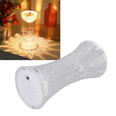 Transparent cylindrical lamp with decorative light on a white background